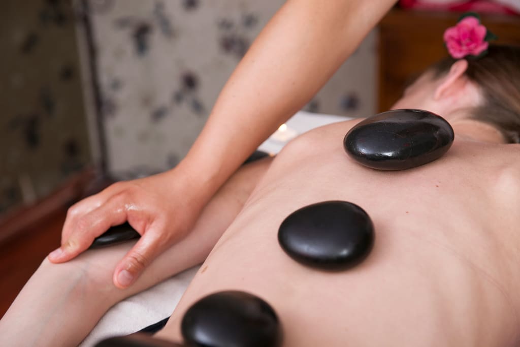 A relaxing hot stone body massage